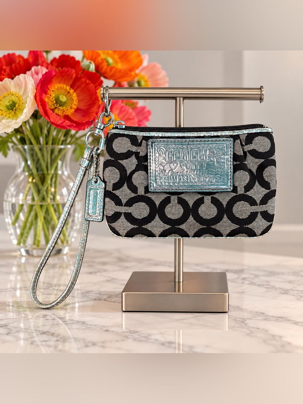Coach Black Signature Poppy Wristlet with Turquoise Metallic Trim